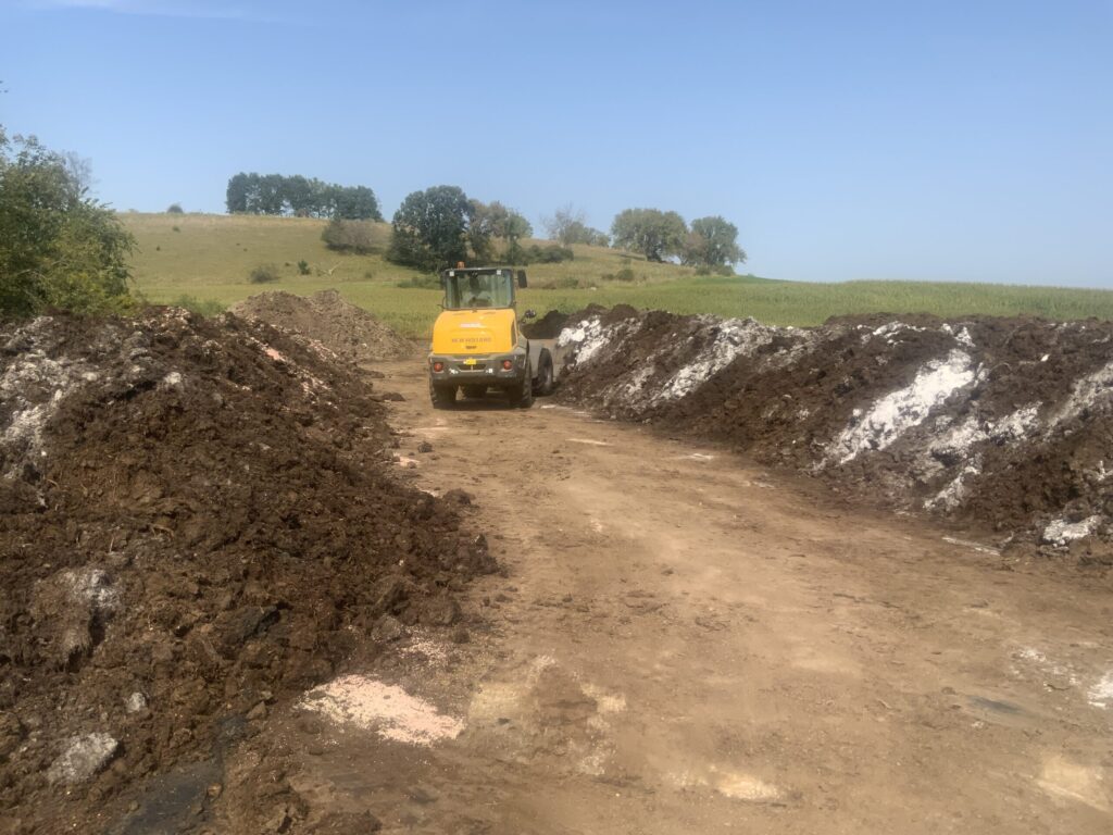 Compost piles — Compost is a great way to add organic matter and nutrients to soil.