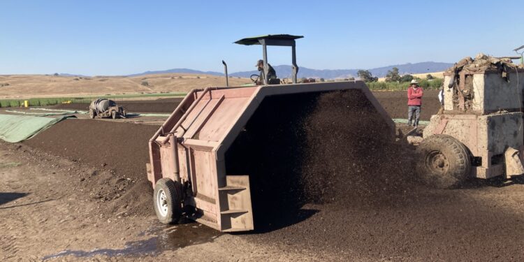 Compost piles (Acres U.S.A.)